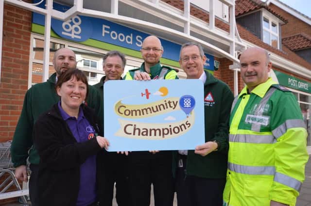 LIVES First Responder Gary Bolton, Lincolnshire Co-ops Hayley Baggott, LIVES First Responders Andy Kerry and Carl Belcher, LIVES Fundraising Manager Stephen Hyde and LIVES Medic Tony Tempest. EMN-150421-134721001