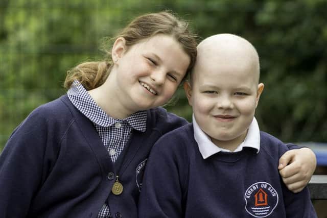 Keeveon Commins-Holland with his friend Alice Dossett.