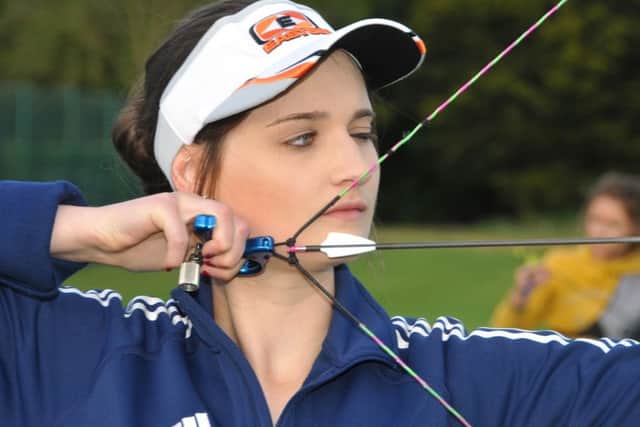 Abbie Spinks takes aim during a Silver Spoon Bowmen of Spalding club night at Sir John Gleed School, Spalding. Photo by Tim Wilson.
