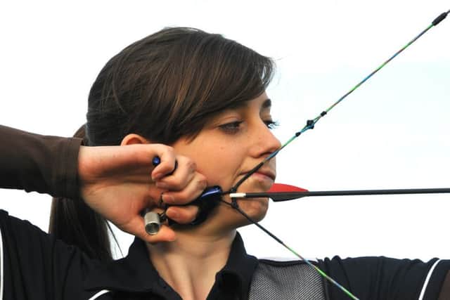 Charlene Marsh in training at Silver Spoon Bowmen of Spalding, Sir John Gleed School, Spalding. Photo by Tim Wilson.