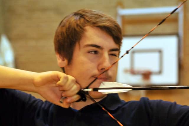 Alex Taylor practices at a Archery GB Junior Development Squad workshop at Spalding Grammar School. Photo by Tim Wilson.