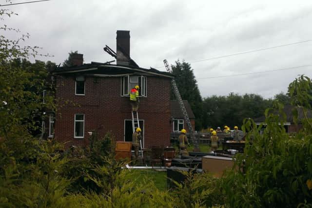 Firefighters at the scene of today's house fire in Stickney.