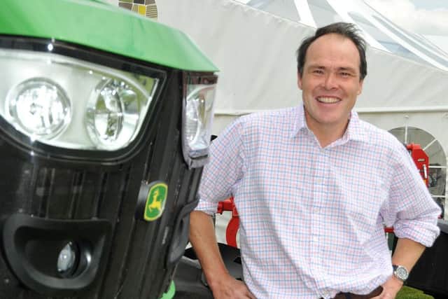 Stafford Proctor checks out the farm machinery at the Lincolnshire Show. ANL-150625-201154001