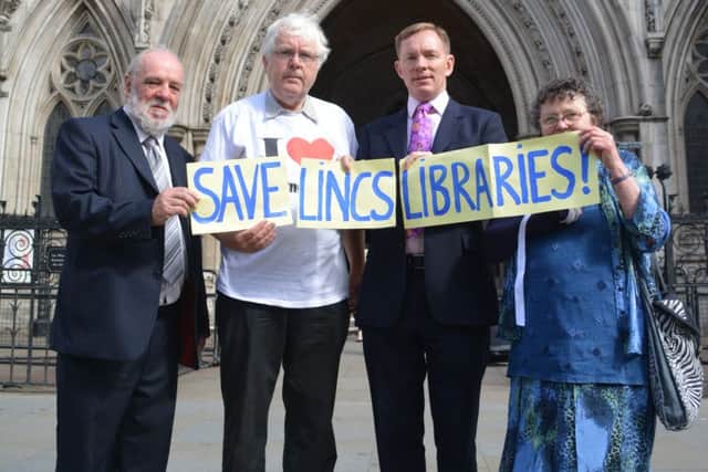 Library campaigners outside the High Court in London. From left, leader of the Labour group at Lincolnshire County Council John Hough, Labour county councillor for Deeping St James Phil Dilks, Labour's shadow minister for libraries Chris Bryant MP and Lesley Hough of Save Lincolnshire Libraries. EMN-150722-102504001