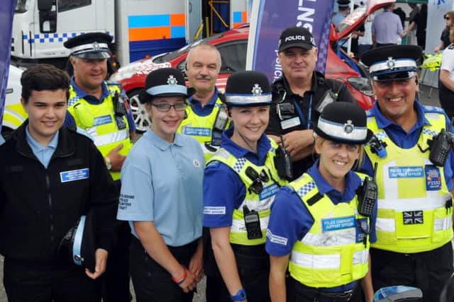 Police Cadets Jordan Wakefield and Erica Halfpenny (front left and second left) with police officers and PCSOs at a community engagement event in Sheep Market, Spalding. Photo by Tim Wilson.