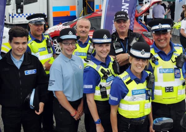 Police Cadets Jordan Wakefield and Erica Halfpenny (front left and second left) with police officers and PCSOs at a community engagement event in Sheep Market, Spalding.  Photo by Tim Wilson.