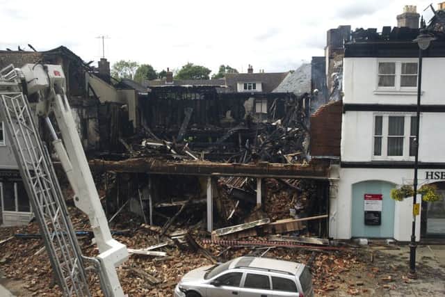 What's left of the Oxfam shop in Sudbury after a fire destroyed the building