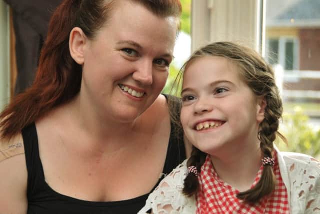 Long Sutton, picture of Alice Bates (8) with her mum, Charlotte.