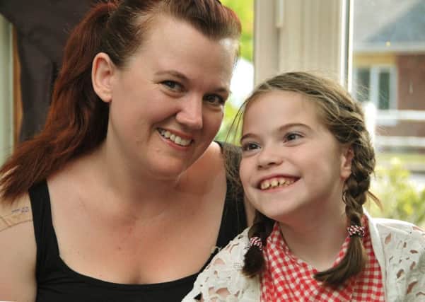 Long Sutton, picture of Alice Bates (8) with her mum, Charlotte.