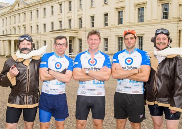 Neil Palmer, Matt McIntyre, Steve Berry, Matt Cryer and Darren Williams after completing their 221-mile cycle from Paris to London. (Photo copyright Anthony Upton.)