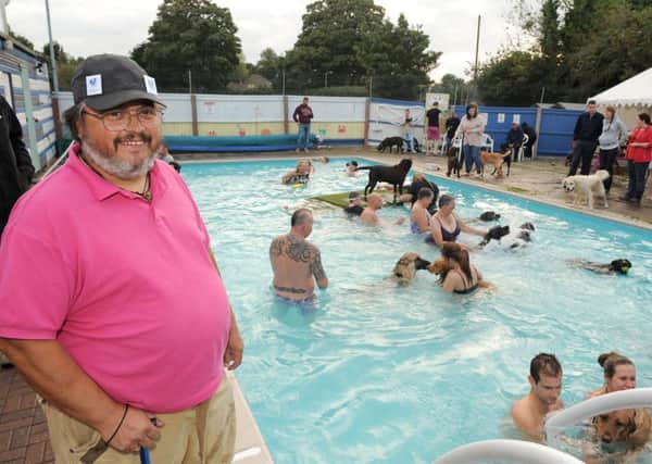 Dogs and owners swimming session at Heckington Swimming pool. Chairman of the pool committee Michael Wells. EMN-151009-112013001