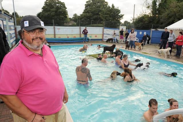 Dogs and owners swimming session at Heckington Swimming pool. Chairman of the pool committee Michael Wells. EMN-151009-112013001