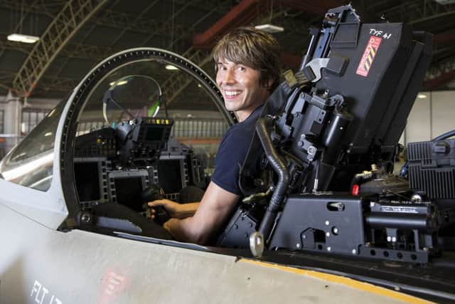 Visiting RAF Coningsby today, Wednesday 9th September 2015, are staff and students of the Jon Egging Trust, also joining them is the Jon Egging Trust patron Professor Brian Cox. the visit was held at 29 Squadron where pilot Flt Lt Helen Seymour showed different aspects of a pilots life, including clothing worn, the simulator and squadron life for many of the trades on the squadron.
Pictured here is Professor Cox sat in the cockpit of 29 Squadrons anniversary Typhoon aircraft. CON-OFFICIAL-