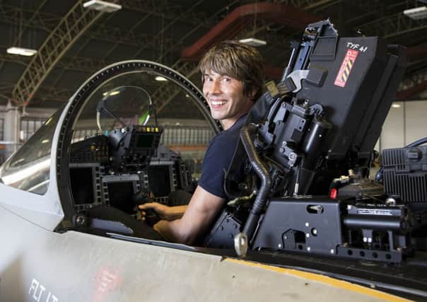 Visiting RAF Coningsby today, Wednesday 9th September 2015, are staff and students of the Jon Egging Trust, also joining them is the Jon Egging Trust patron Professor Brian Cox. the visit was held at 29 Squadron where pilot Flt Lt Helen Seymour showed different aspects of a pilots life, including clothing worn, the simulator and squadron life for many of the trades on the squadron. 
Pictured here is Professor Cox sat in the cockpit of 29 Squadrons anniversary Typhoon aircraft. CON-OFFICIAL-