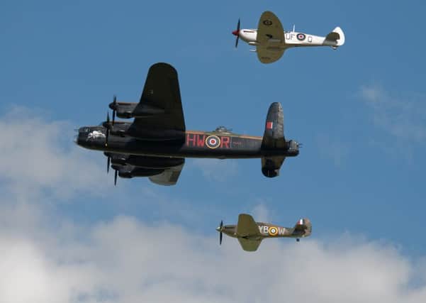The Battle of Britain Memorial Flight at  Waddington International Air Show SUS-140104-115545001