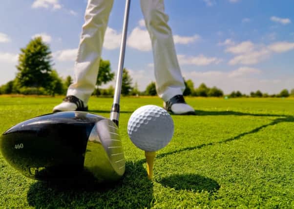 Golfplayer SUS-140605-092452001
