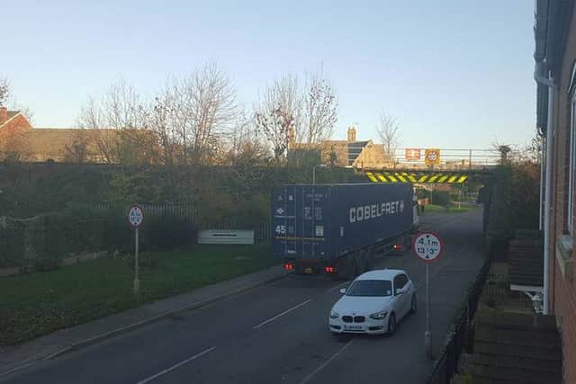 The scene this morning after a lorry collided with a railway bridge at Ancaster. Photo by Lynsey Hutsby. EMN-151211-163535001