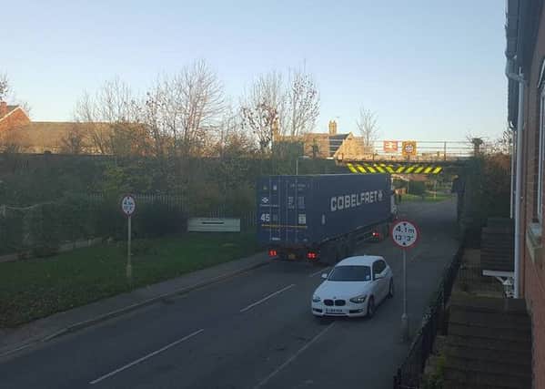 The scene this morning after a lorry collided with a railway bridge at Ancaster. Photo by Lynsey Hutsby. EMN-151211-163535001