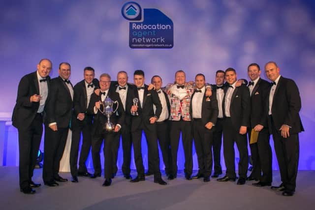 Pygott & Crone celebrating winning the Relocation Agent Network's Agent of the Year award.