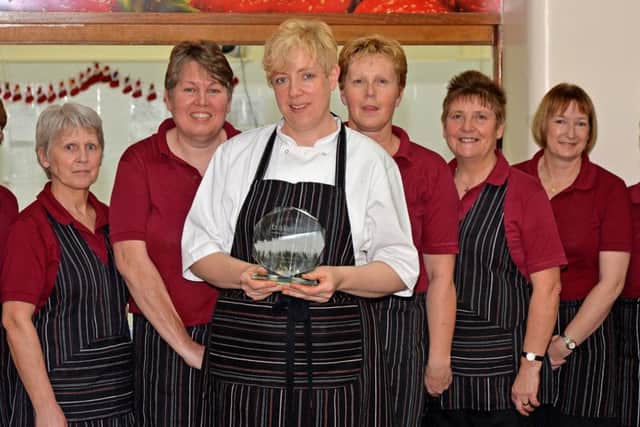 Some of the award winning catering staff at QEGS EMN-151230-161516001