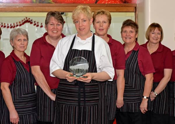 Some of the award winning catering staff at QEGS EMN-151230-161516001