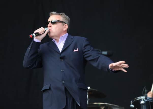 Suggs of Madness on stage. EMN-160401-154736001