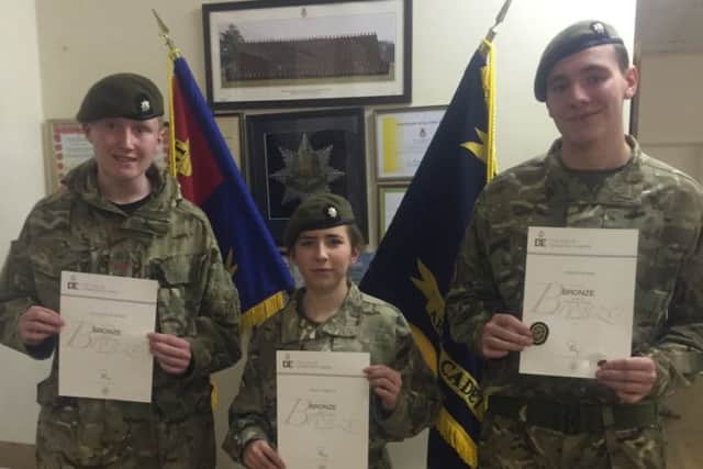 Pictured, from left, is Cpls William Howard, Emily Proud and Ewan Wood.