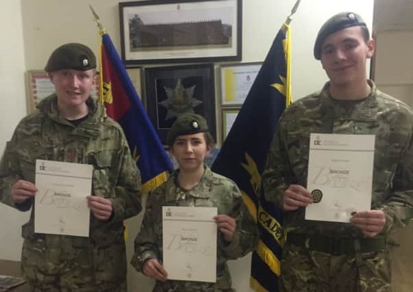 Pictured, from left, is Cpls William Howard, Emily Proud and Ewan Wood.
