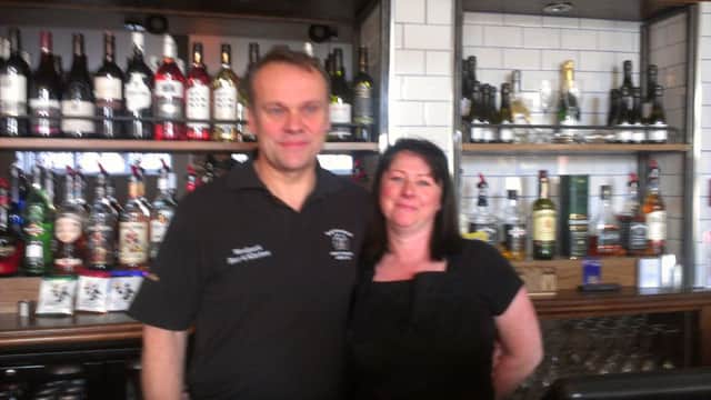 Iain and Johann Jubbs at the bar of Batemans  Woolpack Pub and Kitchen in Wainfleet. ANL-160117-143326001