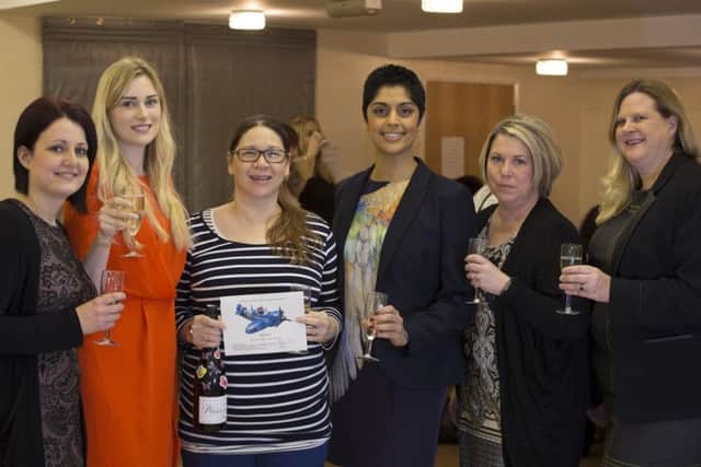 Mel Handley, Phoebe Woods-Johnston, logo winner Paula Walster, Kiran Attridge, Jules Davidson and WI president Annabel Burgess-Durston EMN-160114-153430001