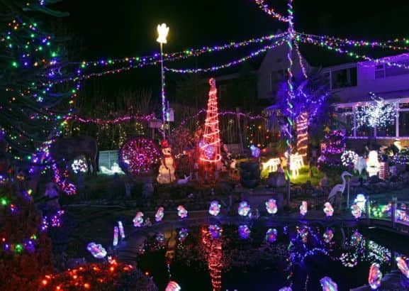 Derek and Jean Turner's home, in Louth Road, Wragby, lit up the street over Christmas and has raised almost £1,100 for charity.