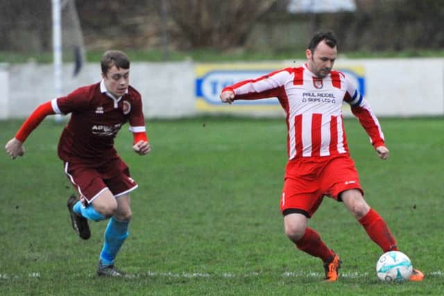 Action from Horncastle Town's 3-1 defeat at Lincoln Railway AFC on Saturday. Photo: Nigel West