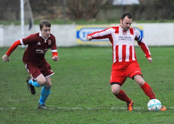 Action from Horncastle Town's 3-1 defeat at Lincoln Railway AFC on Saturday. Photo: Nigel West
