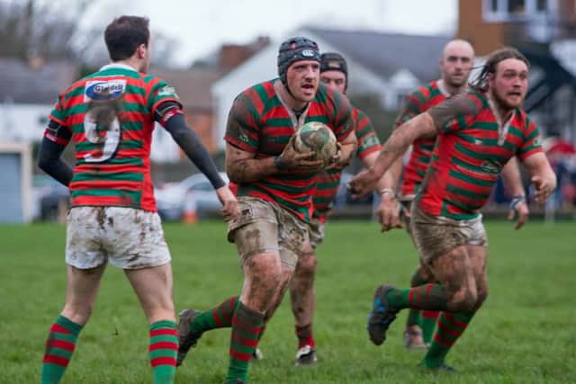 Christian Mills on the charge for Market Rasen against Newbold EMN-161101-175132002