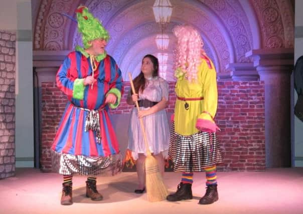 Richard Young and Peter Swann as the Ugly Sisters with Sophie Bullingham as Cinderella EMN-161201-065430001