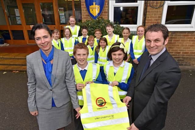 Bright jackets are presented at Horncastle Primary School EMN-161201-093022001