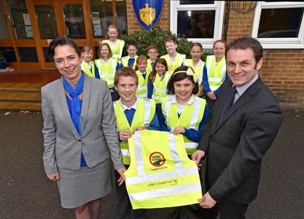Bright jackets are presented at Horncastle Primary School EMN-161201-093022001