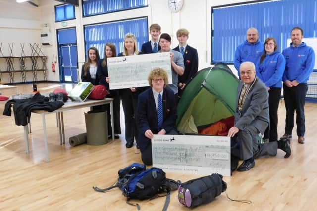 Donations from Lincolnshire Co-operative Community Champions fund and the Rotary Club of Sleaford help create an equipment store for Duke of Edinburgh Award expeditions at St George's Academy. EMN-160119-131550001