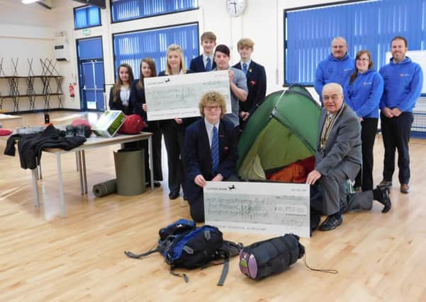 Donations from Lincolnshire Co-operative Community Champions fund and the Rotary Club of Sleaford help create an equipment store for Duke of Edinburgh Award expeditions at St George's Academy. EMN-160119-131550001