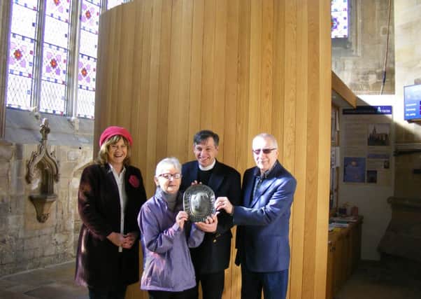 Celebrating their award, from left - Maggie Carr, churchwarden Anne Smillie-Pearson, Rev Philip Johnson and churchwarden Richard Clash. EMN-160118-144618001