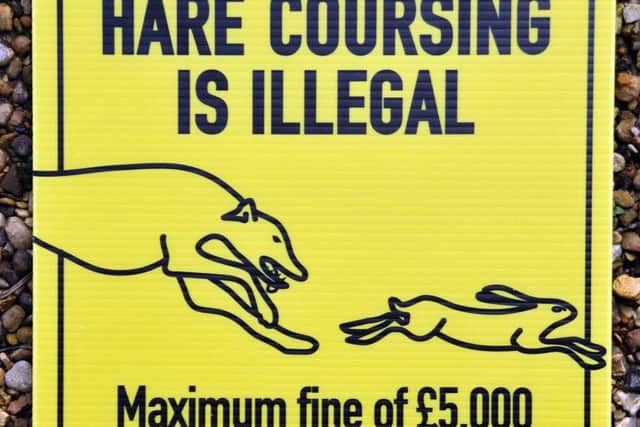 Hare coursing signs hand-out to Crowland Farmer Rex Sly.