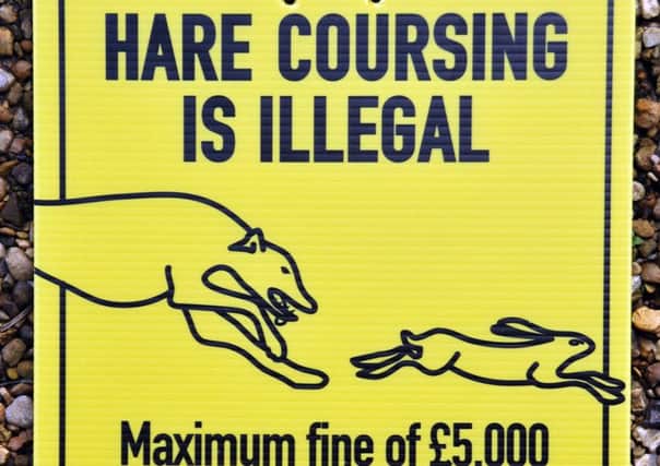 Hare coursing signs hand-out to Crowland Farmer Rex Sly.