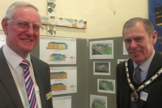 The Rev Colin Bowden and Mayor Coun Neil Cooper with an artists impression of the Burgh Baptist Church expansion. ANL-160125-115606001