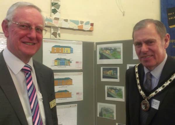The Rev Colin Bowden and Mayor Coun Neil Cooper with an artists impression of the Burgh Baptist Church expansion. ANL-160125-115606001
