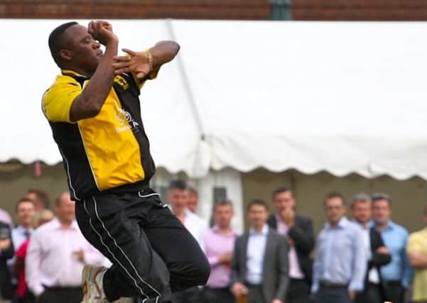 Devon Malcolm in the famous Lashings yellow. ENGSUS00220121206123142
