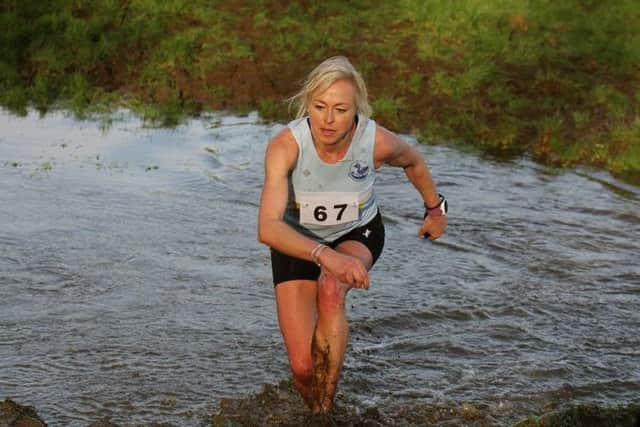 Janine Stones was first veteran lady in her category in the Lincolnshire Runner Cross Country League EMN-160118-160356002