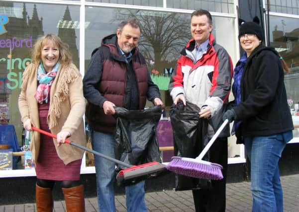 Get ready to Clean for the Queen. Sleaford Town Team members, from left - Bev and Eddie Jenkins, Andrew Rayner and Ruth Philp. EMN-160119-094743001