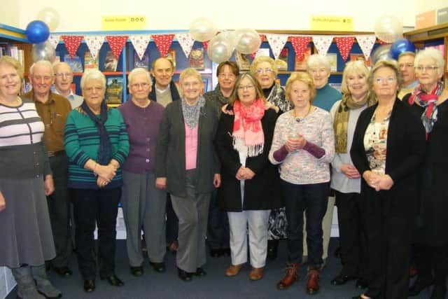 Metheringham Community Library volunteers celebrate teh official opening.