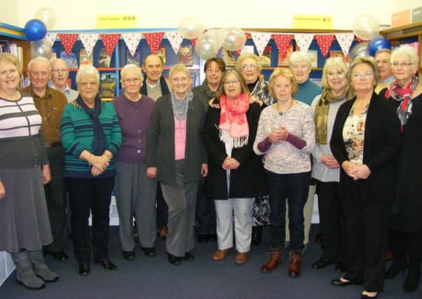 Metheringham Community Library volunteers celebrate teh official opening.