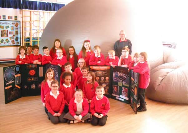 Children of St Andrews Primary School with Starlincs mobile planetarium